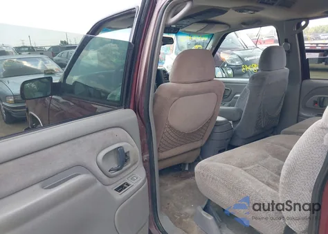 1999 Chevrolet Suburban 1500 z USA, uszkodzony, nr VIN 1GNFK16R8XJ428376